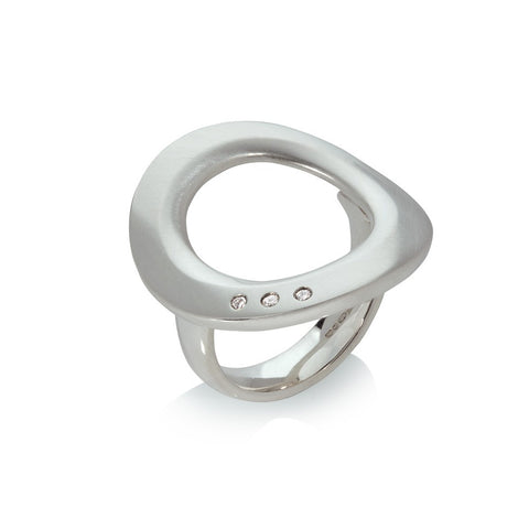 A Sterling Silver Ring as a large 'Halo' set with 3 small Diamonds, designed by Sabine König.