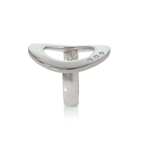 A Sterling Silver Ring as a large 'Halo' set with 3 small Diamonds, designed by Sabine König.