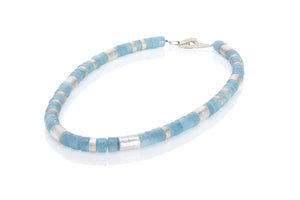 Aquamarine Necklace Round beads with Silver elements. Design by Sabine Konig